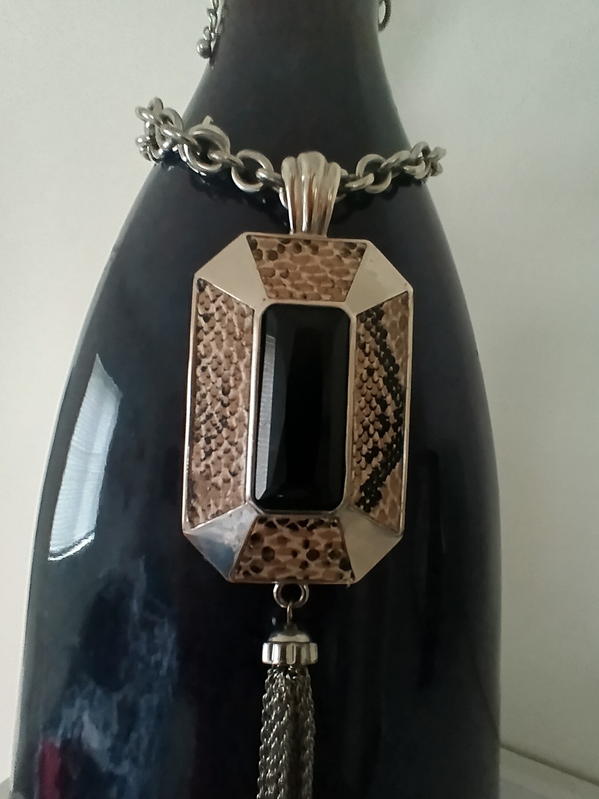 Silver Chain w/ Large Black Pendant Surrounded By Snake Print and Long Tassles