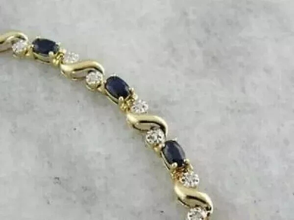 6.81 Ct Oval Cut Simulated Sapphire Unique Tennis Bracelet 14K Yellow Gold Over