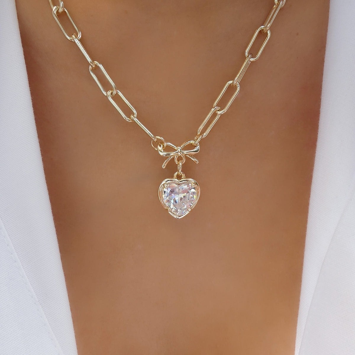 LoveStylize Nora Crystal Heart Necklace Gold Tone Bow Paperclip Chain JC1694
