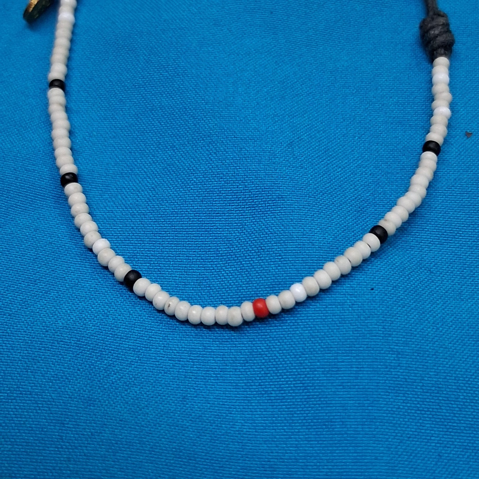 Bead Relief White Channel Set Stone Bead Black Cotton Cord Bangle Bracelet
