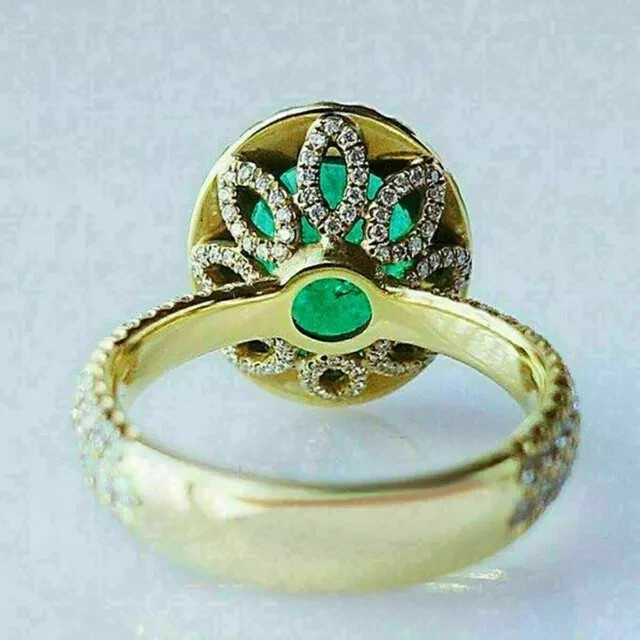 3 Ct Oval Cut Lab-Created Emerald Halo Engagement Ring In 14K Yellow Gold Plated