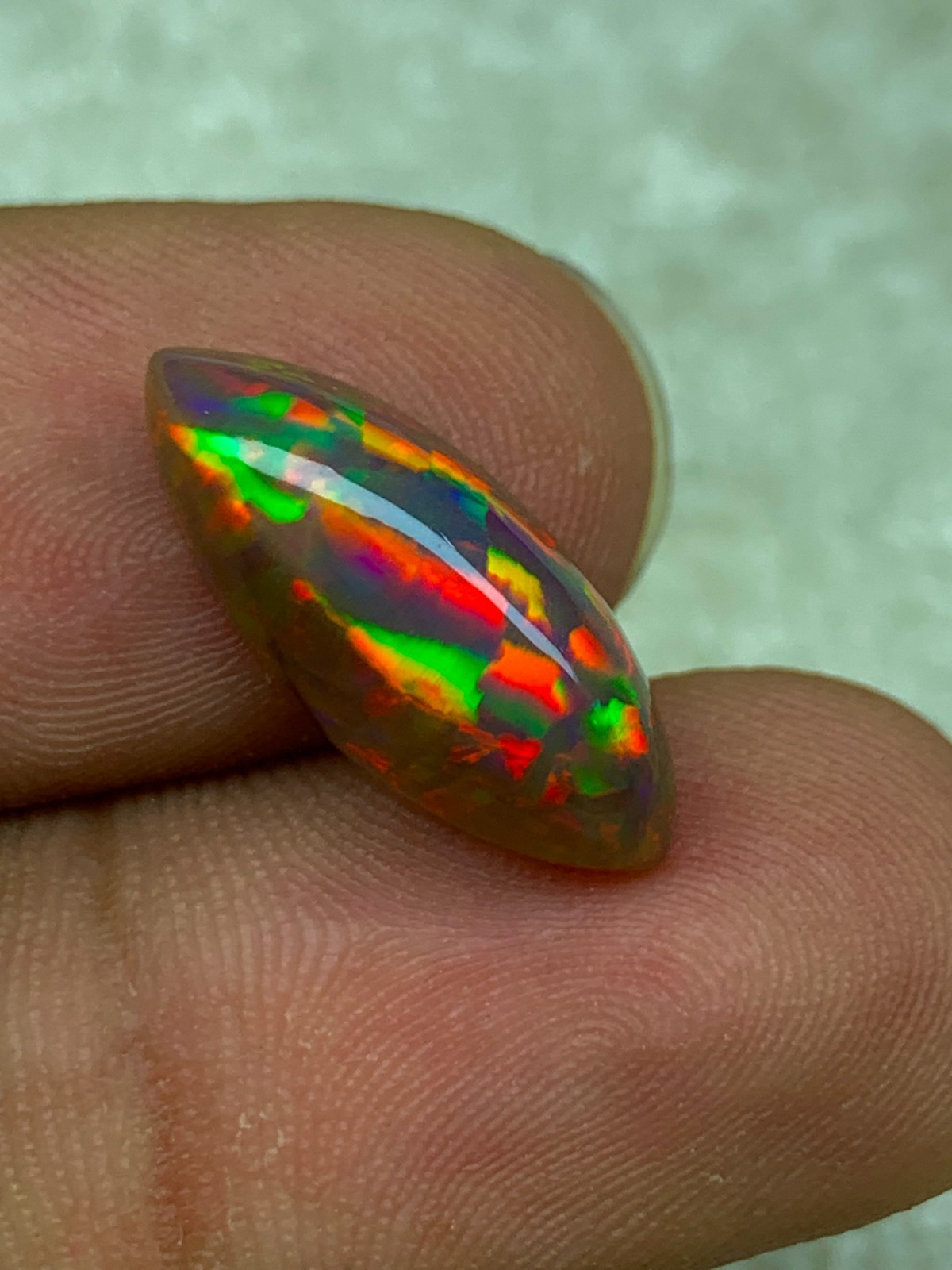 Shewa Chocolate Ethiopian Opal Gemstone 4.55 Carat Multi-Fire Marquise Cabochon