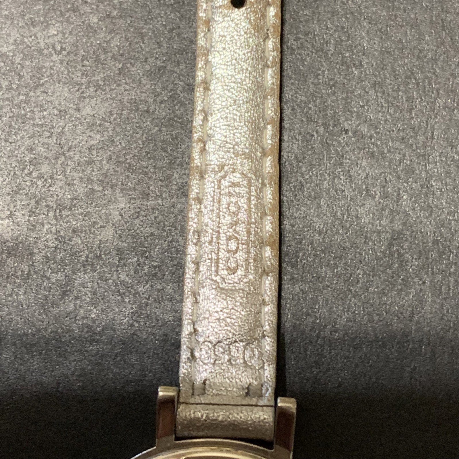 Coach Pastel Signature C watch featuring a white dial with a multicolor logo