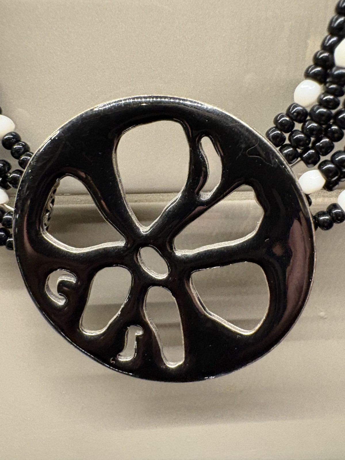 Chicos Necklace Black Pendant with Flower Cut out and Black & White Beads