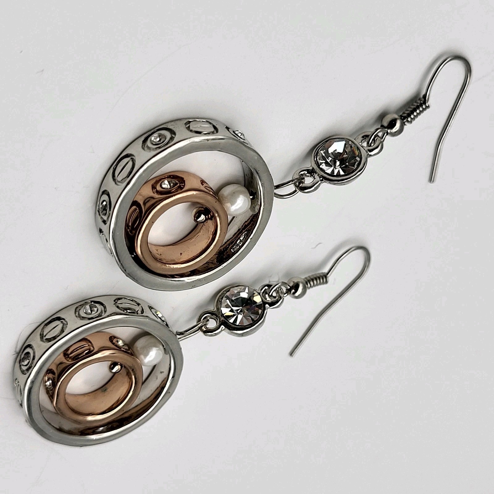 Fun Mixed metals articulated earrings screw print pierced dangles