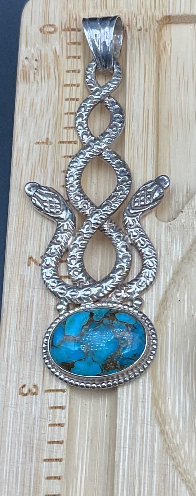 sterling silver vintage intertwined serpentine ( double snake) turquoise pendant