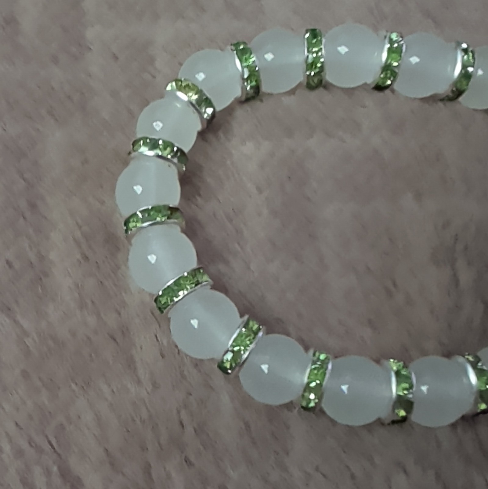 White/Green Round Beaded Stretch Bracelet w/ Green Rhinestone Spacer Rings