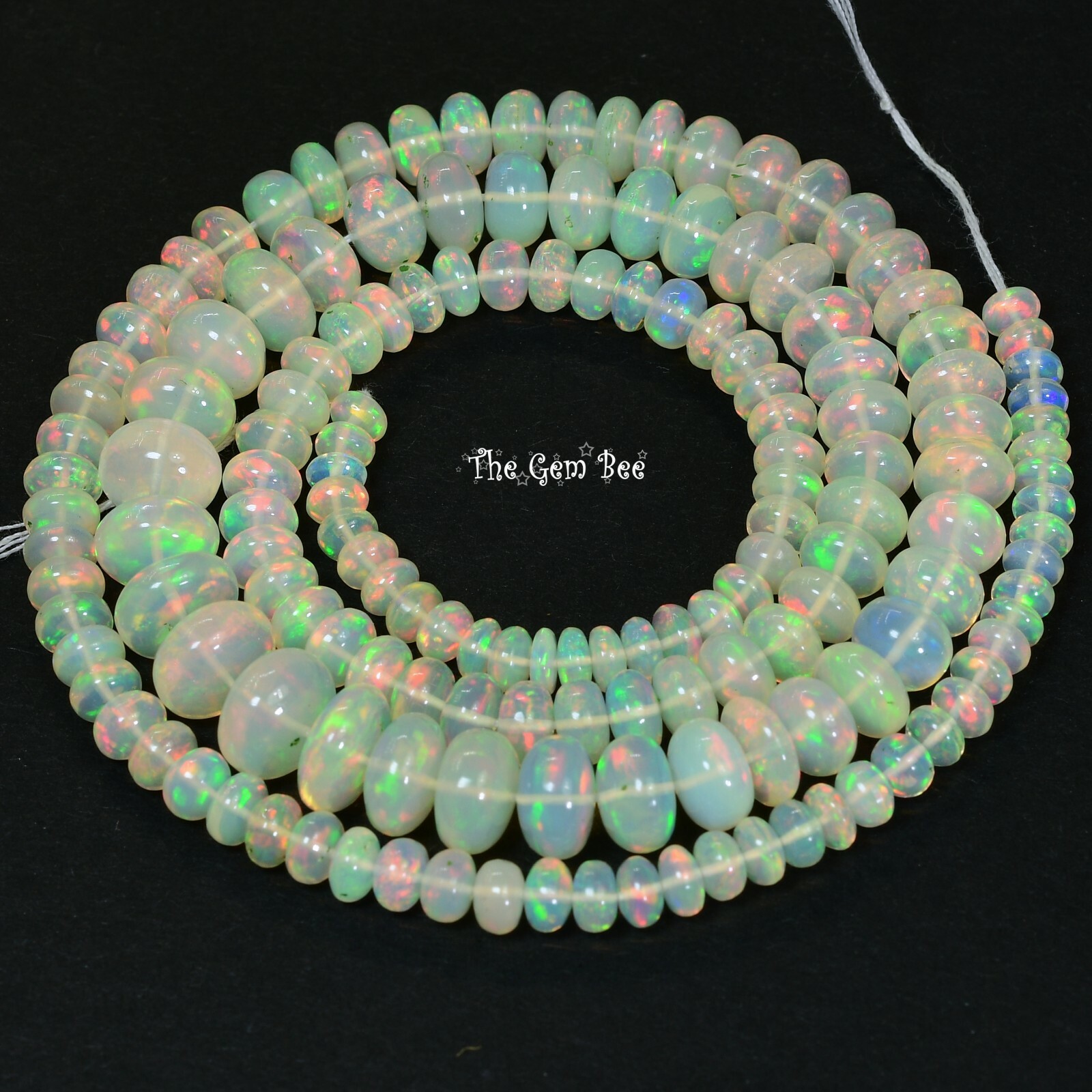 4.2mm-9.2mm Large Fine Ethiopian White Opal Smooth Rondelle Beads 22.3″ Strand