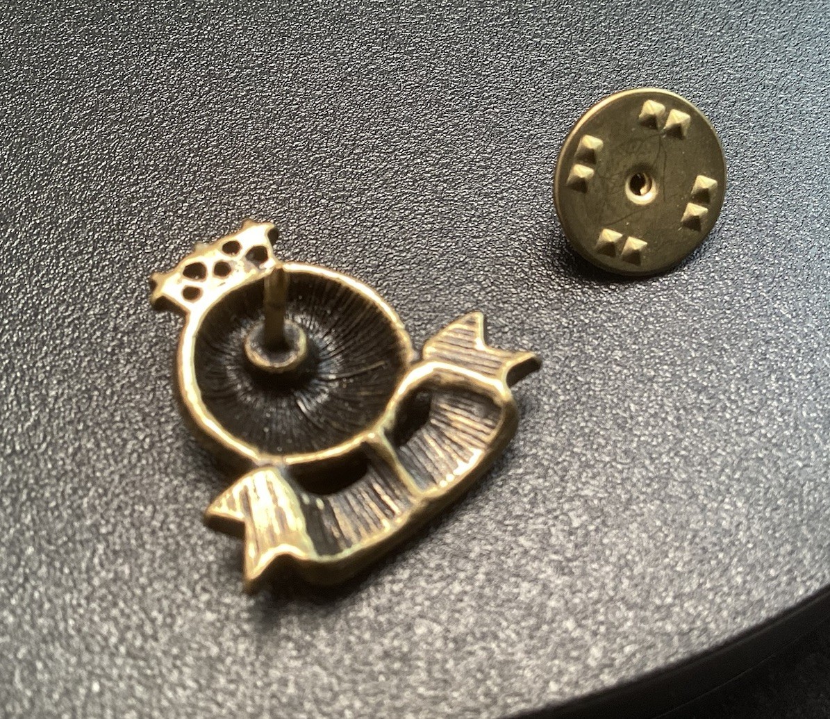 Black And Gold Tone 2000 World Lapel Hat Pin With Stars