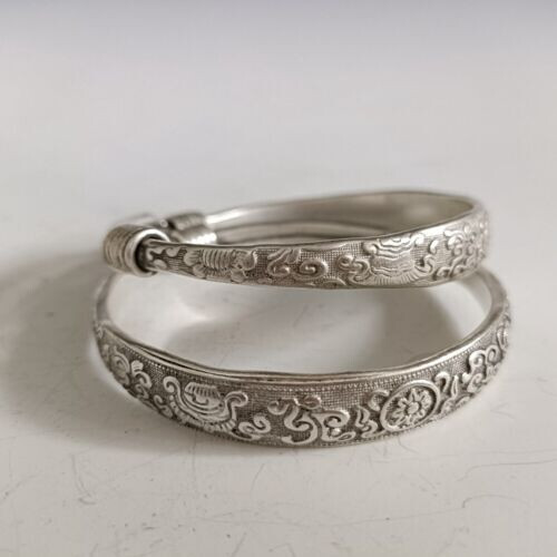 A Pair Old Chinese tibet silver handcarved Auspicious patterns Bracelets