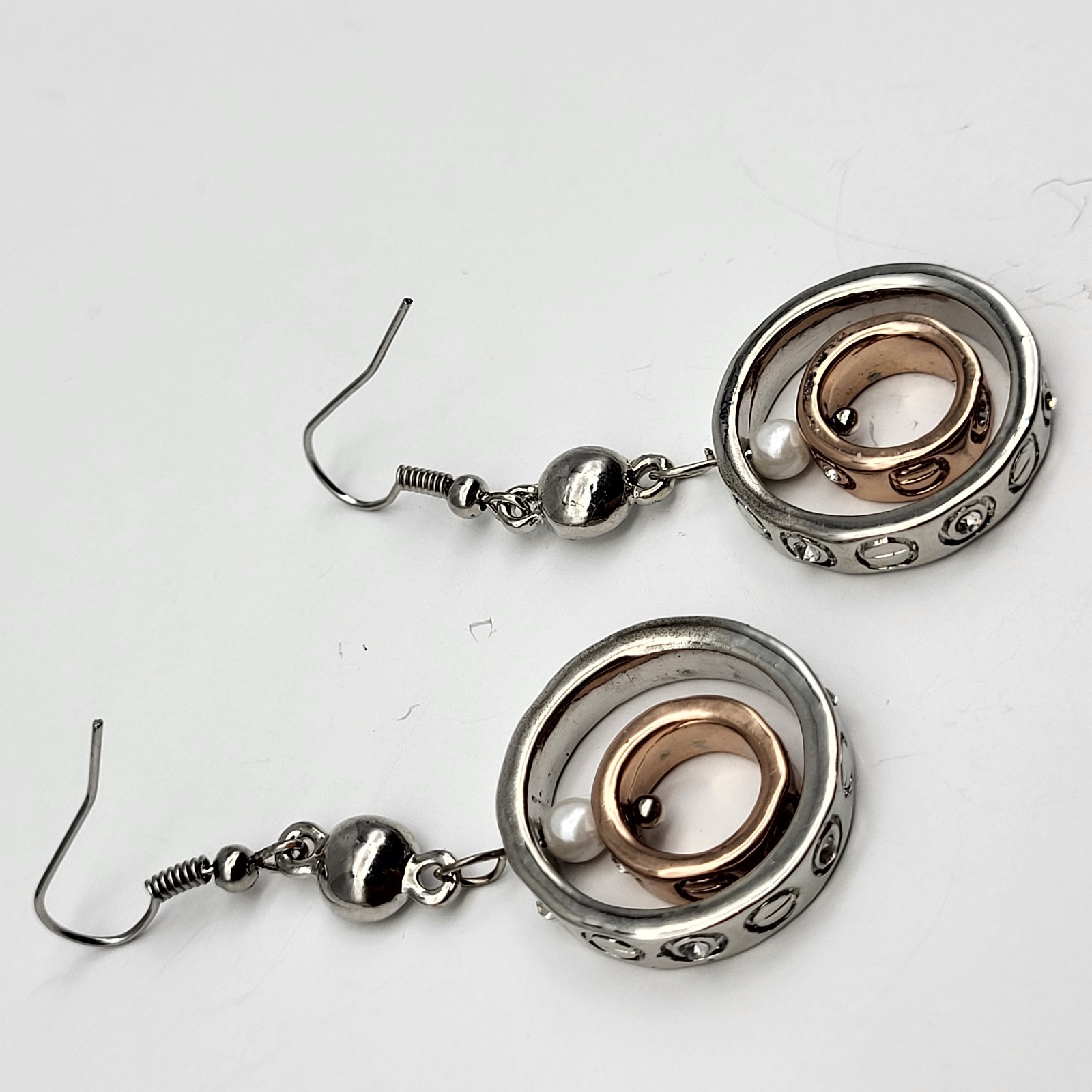 Fun Mixed metals articulated earrings screw print pierced dangles