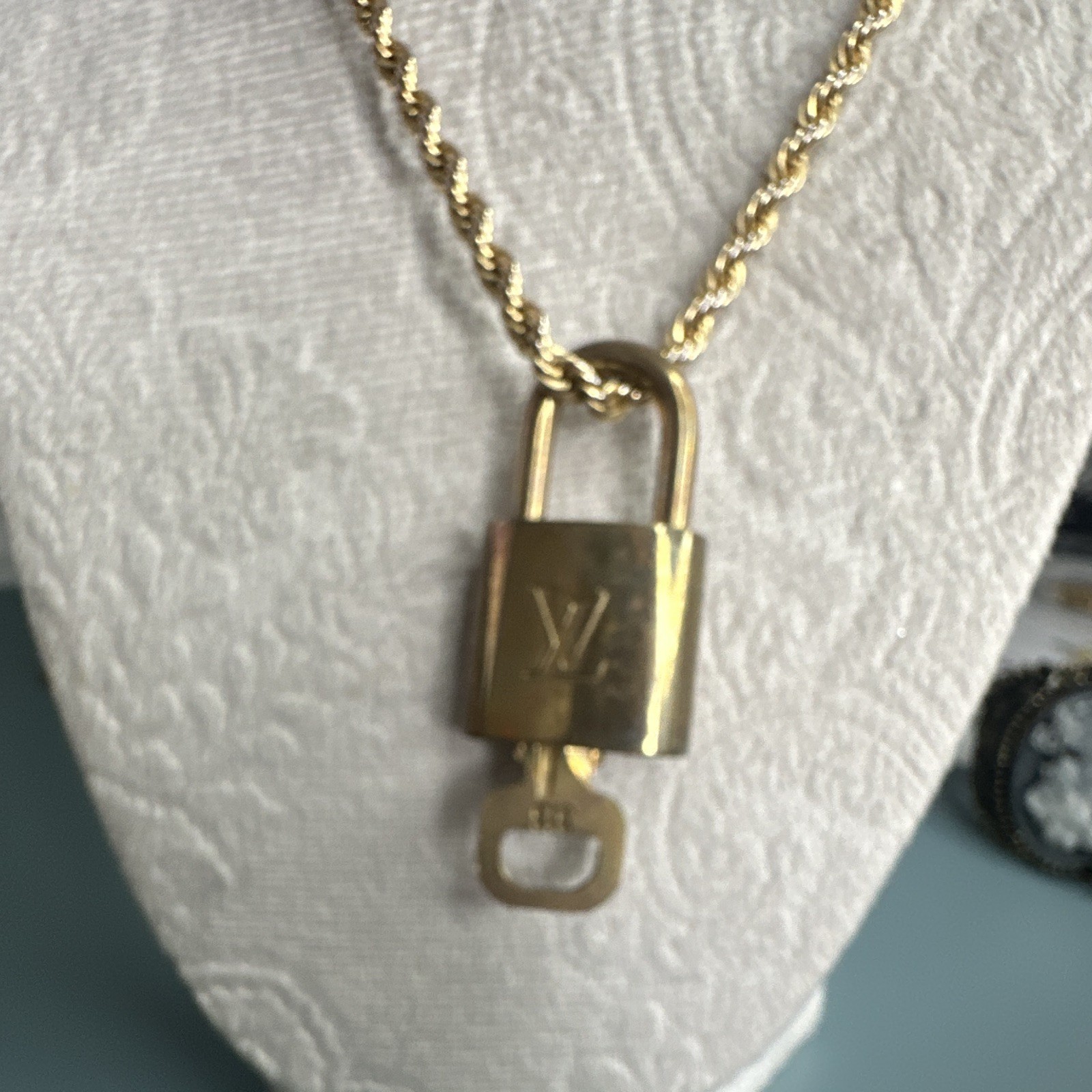 Louis Vuitton Signed Gold Tone Padlock Charm and key. #313