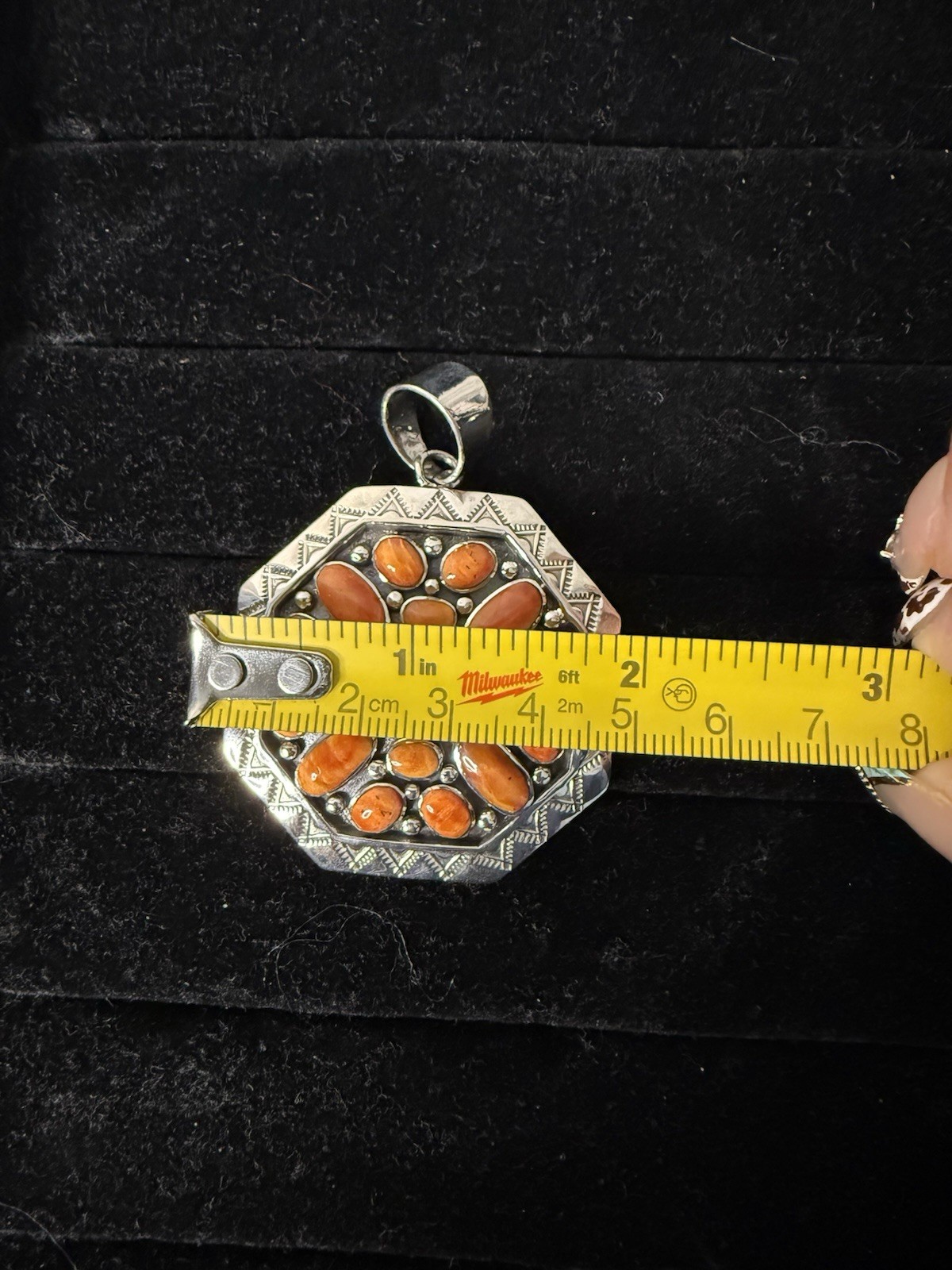 Handcrafted authentic Kenneth Jones Navajo orange spiny cluster pendant