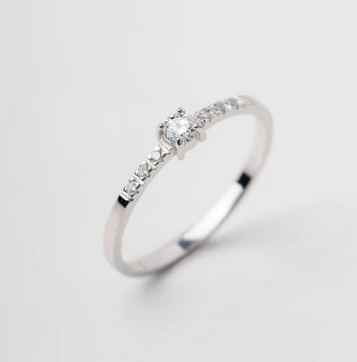 Bright Pave Set Round Cut Moissanite Women’s Wedding Band In Pure 10K White Gold