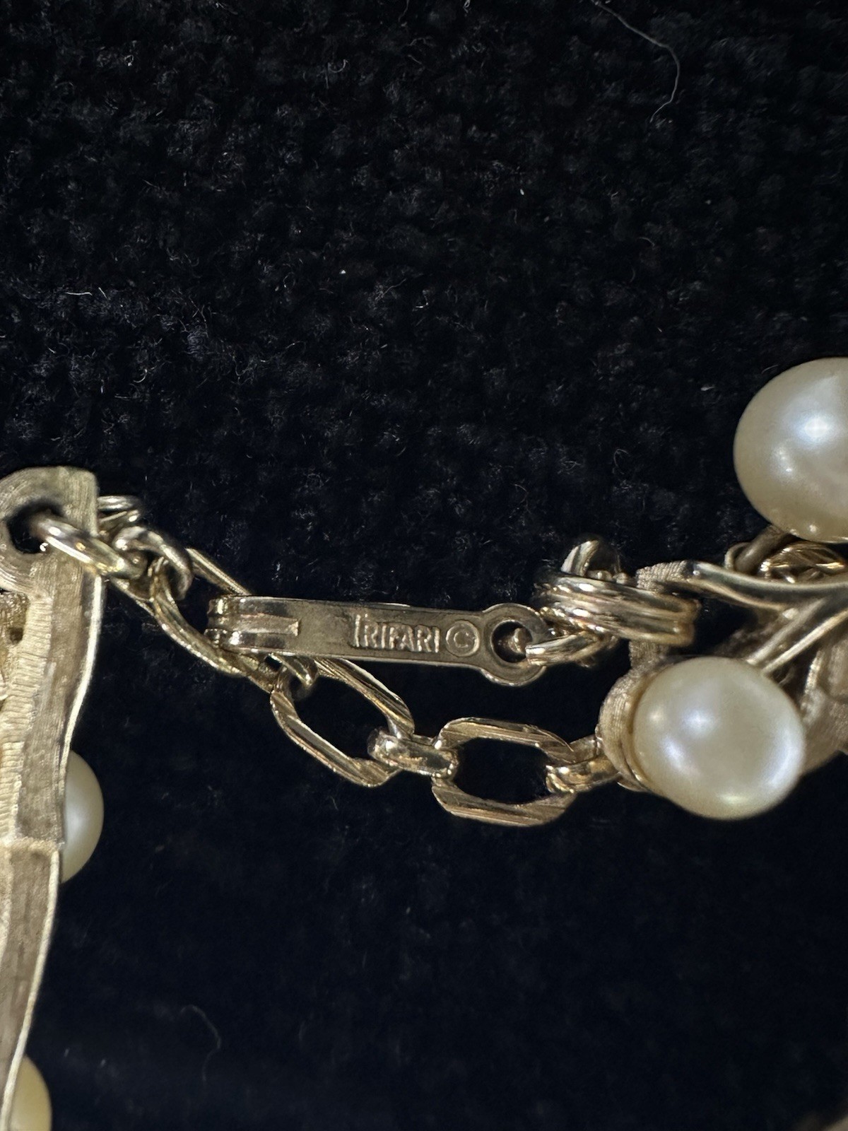 Vintage Crown Trifari Signed brushed Gold Tone Faux Pearl with rhinestone.