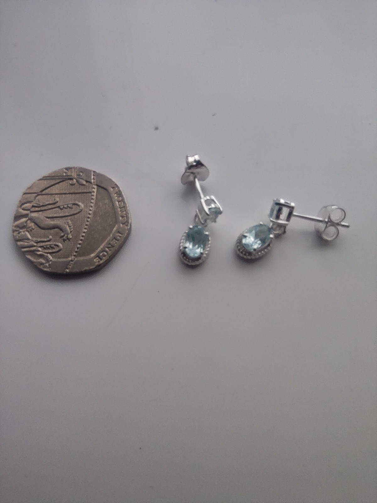 AAA Sky Blue Topaz 925 Sterling Silver “Articulated Droplet” Earrings.