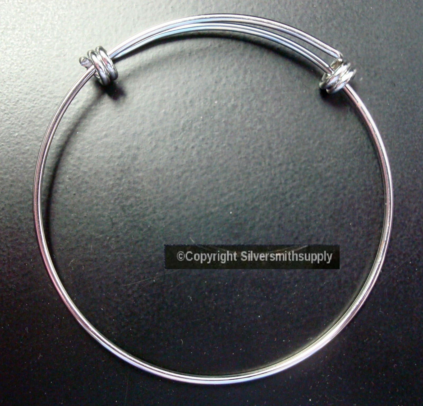 Bangle bracelet adjustable size from 7-9 in wrapped coil ends adjustable FJ058