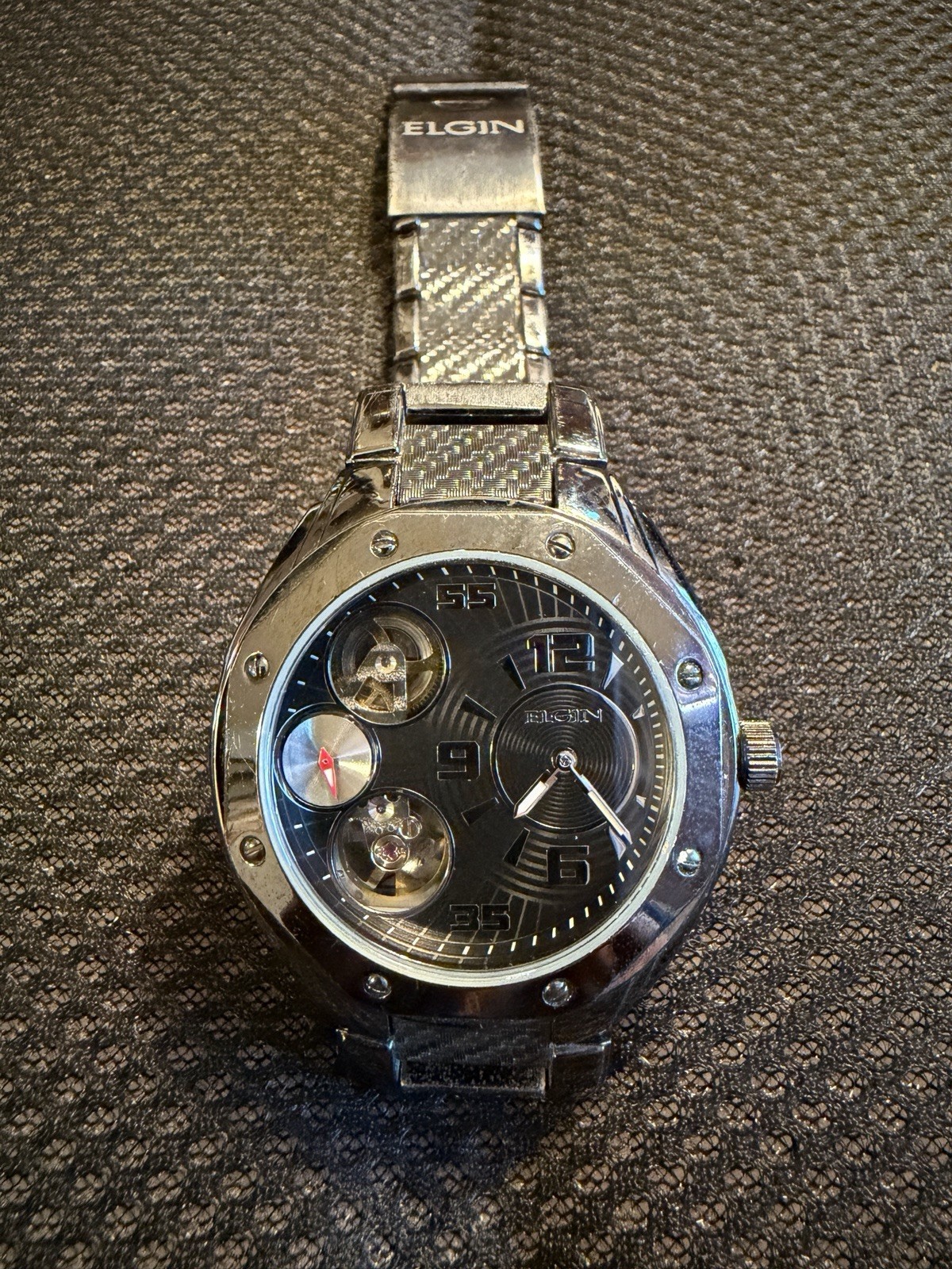 Elgin Skeleton Open-Heart FG2014S 032 pre-owned carbon fiber