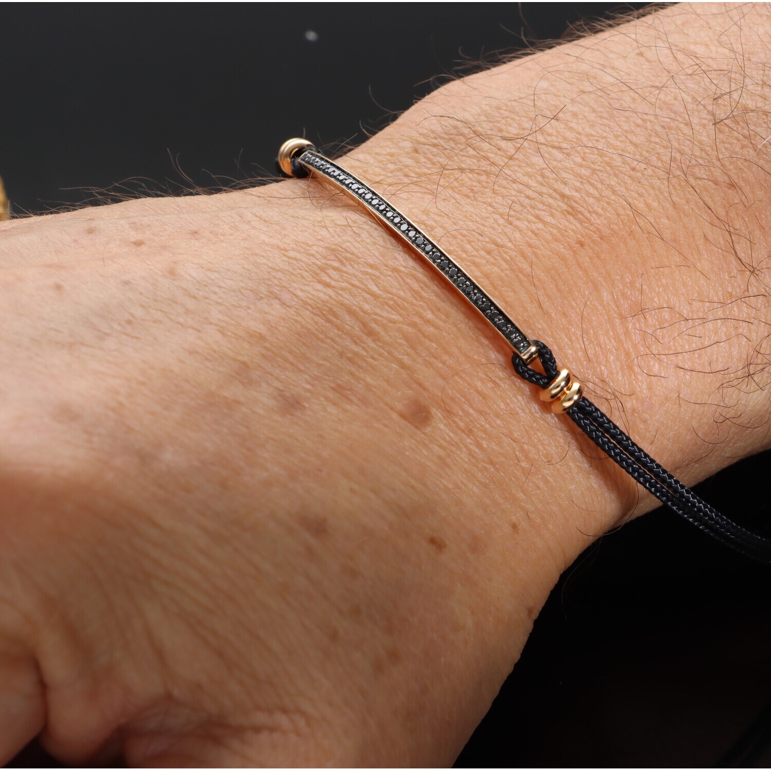CRIVELLI 750/1000 GOLD DRAWSTRING BRACELET, 18 KT, BRILLIANT BLACK