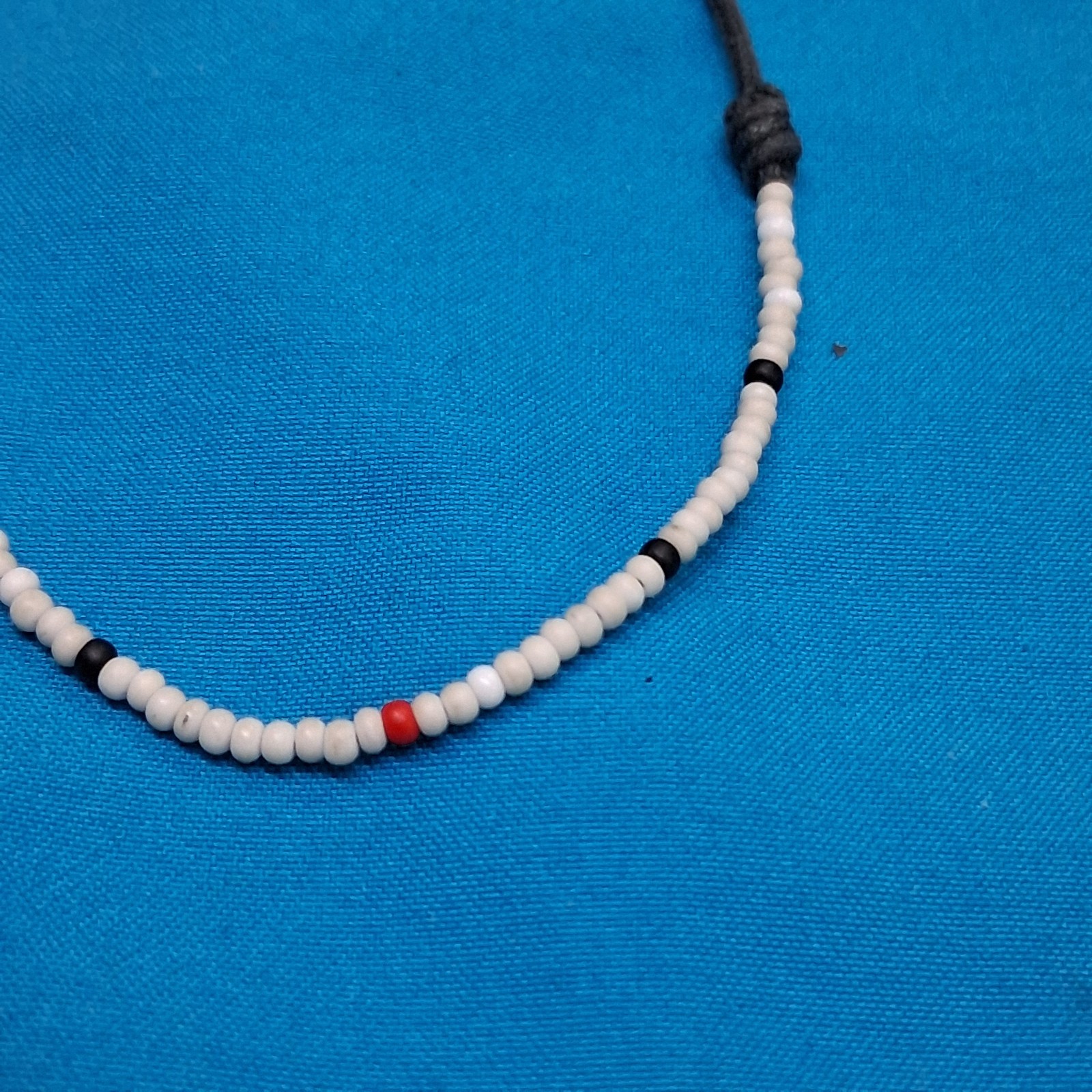 Bead Relief White Channel Set Stone Bead Black Cotton Cord Bangle Bracelet