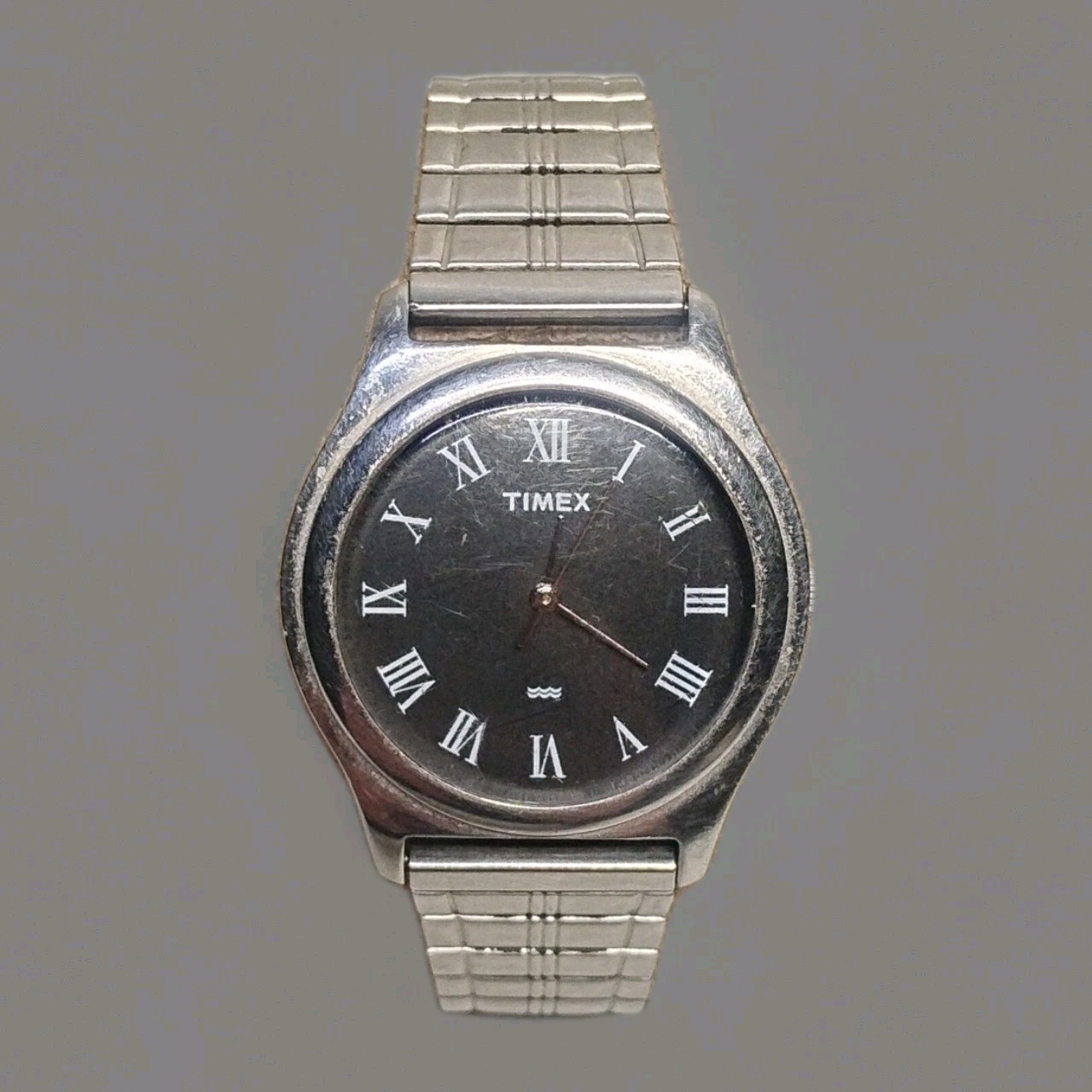 Vtg 35mm Timex Men’s Quartz Black Dial Roman Numeral Silver Tone Watch PS12-E-FG