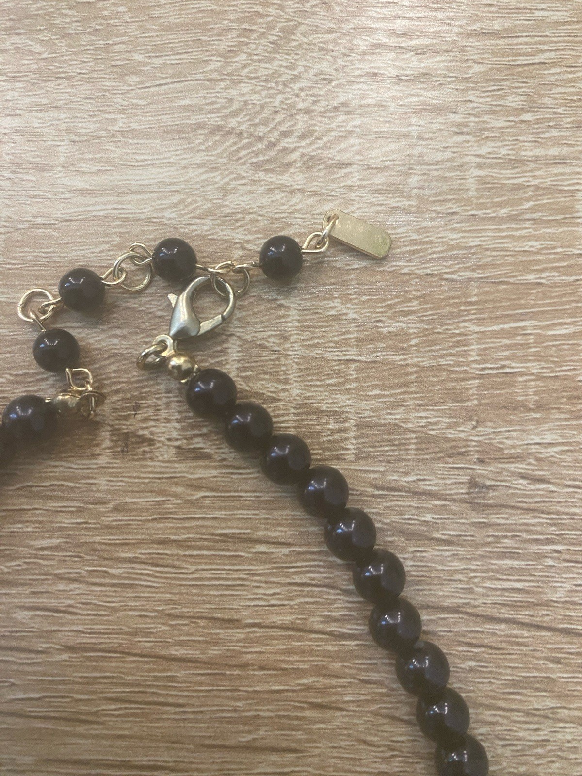 Classic Glossy Black Beaded Necklace Sparkling Rhinestone Accent Gold Tone Clasp