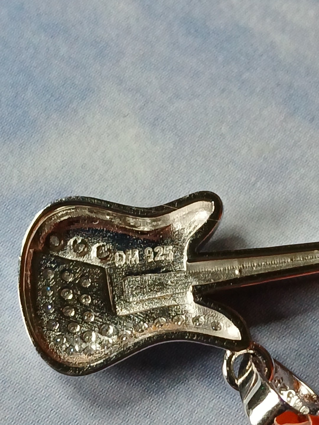 Sterling Silver .50ctw Moissanite Guitar Pendant W/ Rhodium Platinum Plating
