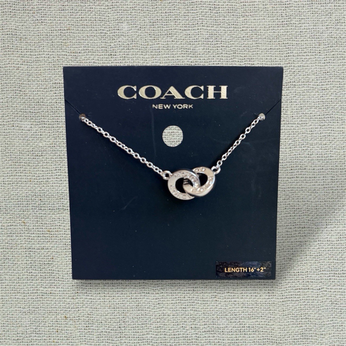 Authentic Coach Silver Interlocking Ring Necklace 16″+2″ Chain New w/ Card