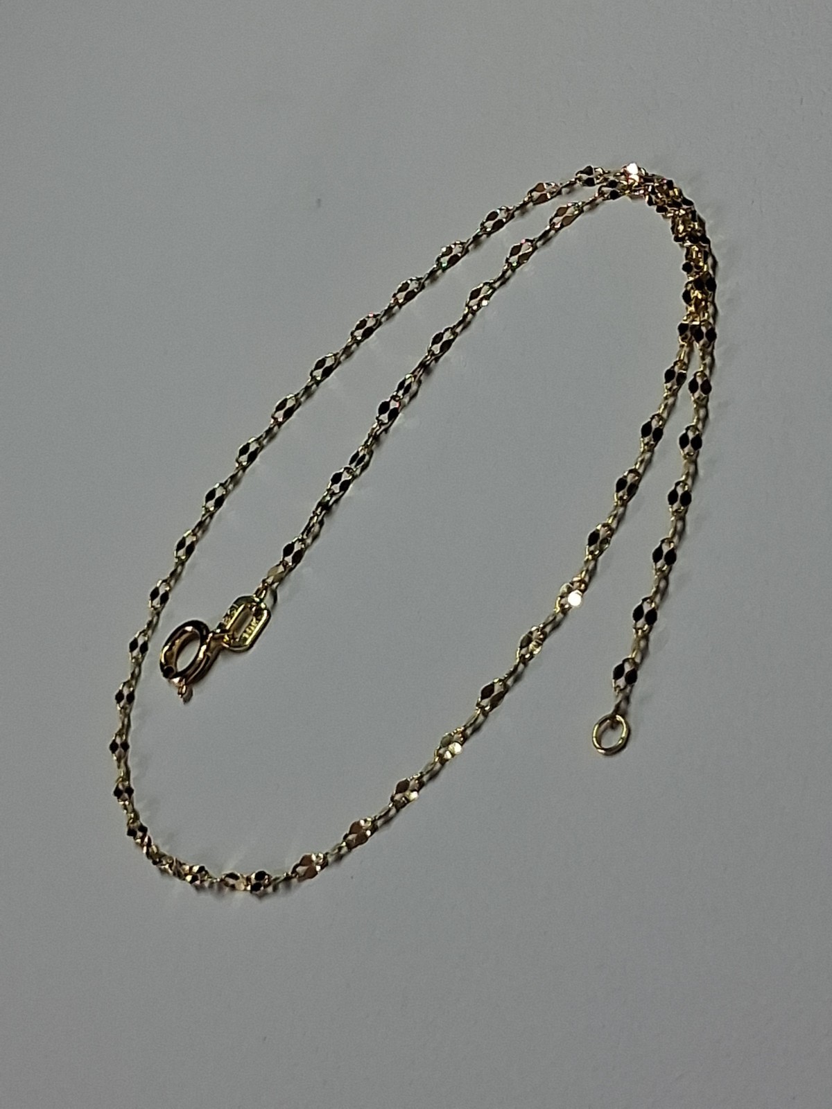 10k Gold Mirror Link 10″ Anklet 1.3mm, .4gr