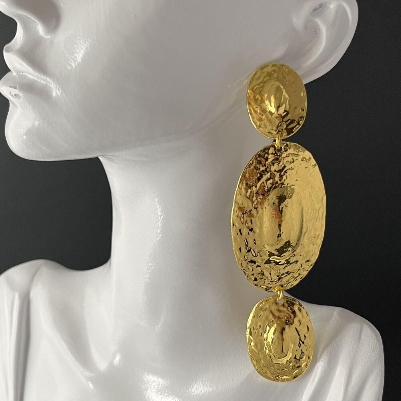 A Pair Brutalist Pierced Dangle Gold Tone Hammered Tribal Runway Earrings