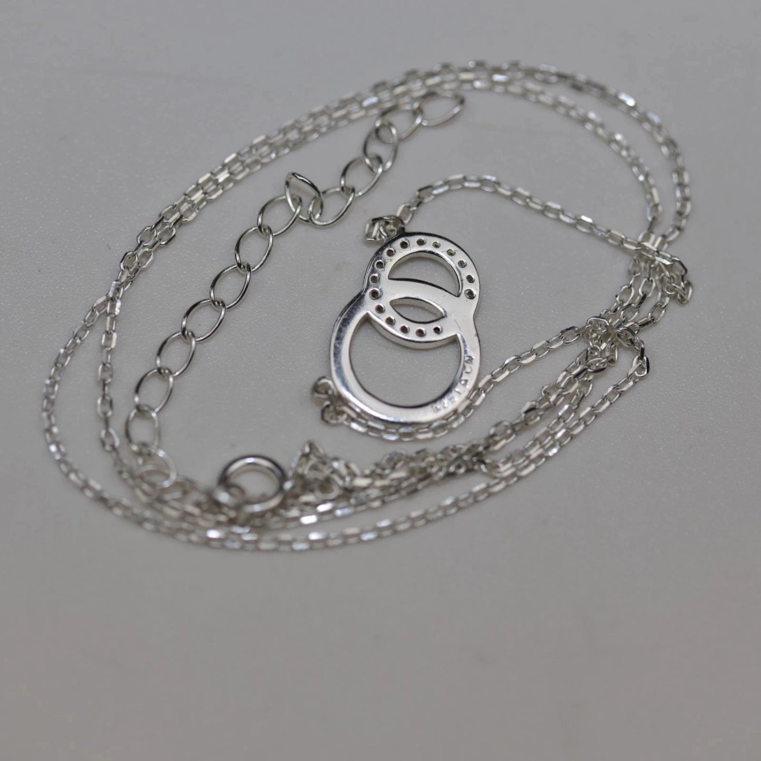 Lacn Necklace 16-18 Inch Silver Sterling Interlocking Rings Pendant