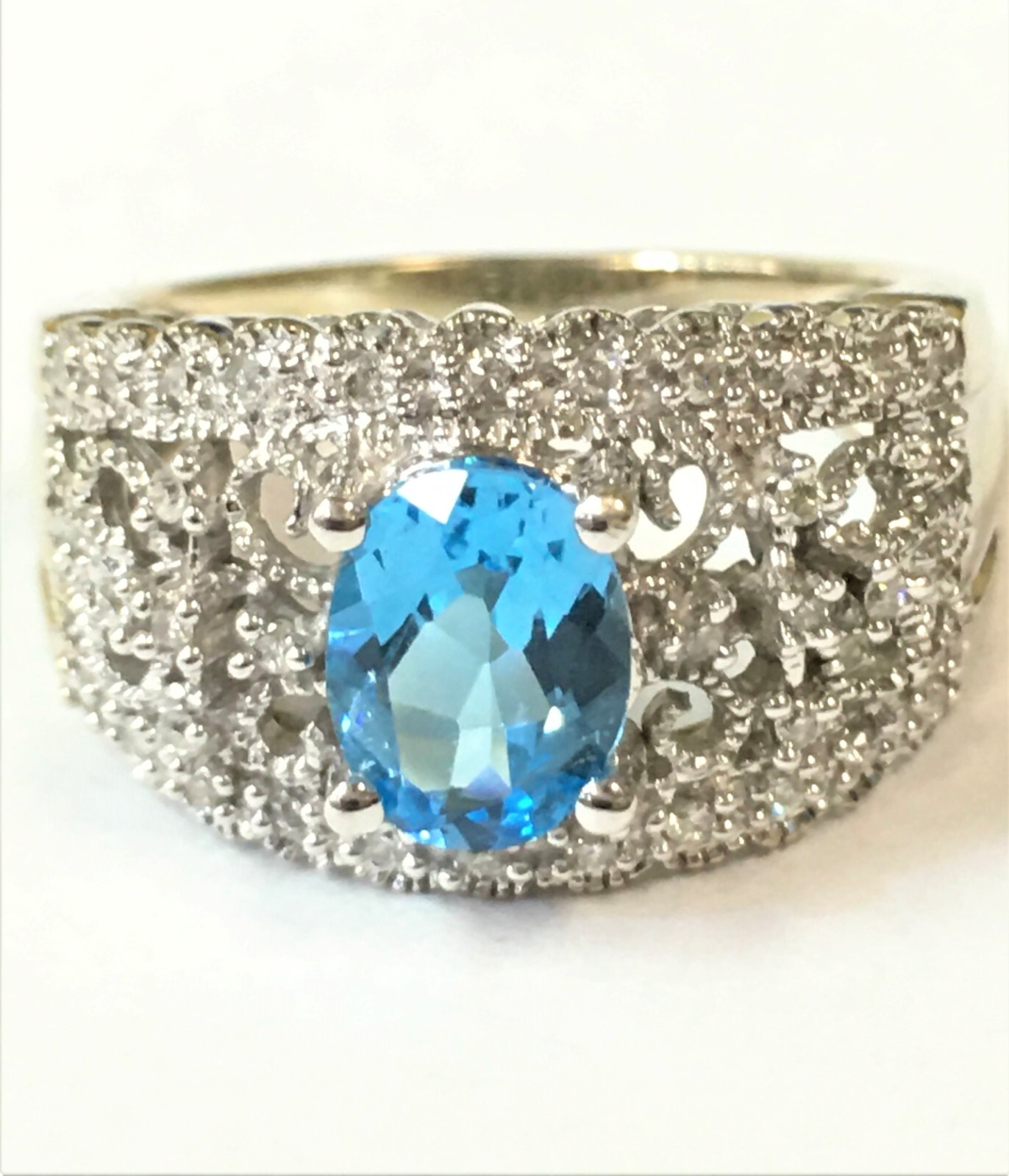 14k White Gold Ring with Blue Topaz and 0.16ctw Diamonds (Size 6.75) 5.3 gram