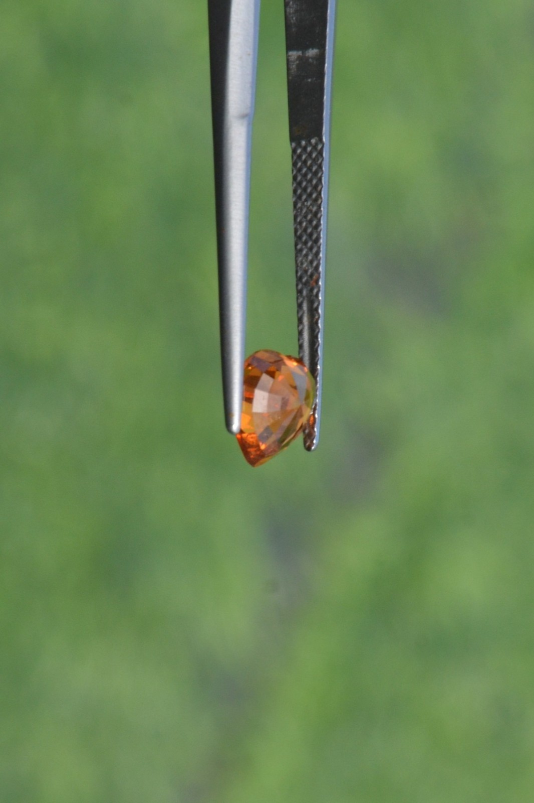 Natural Orange Sapphire 1.35 Carat. BE. Heated Heart Step Cut
