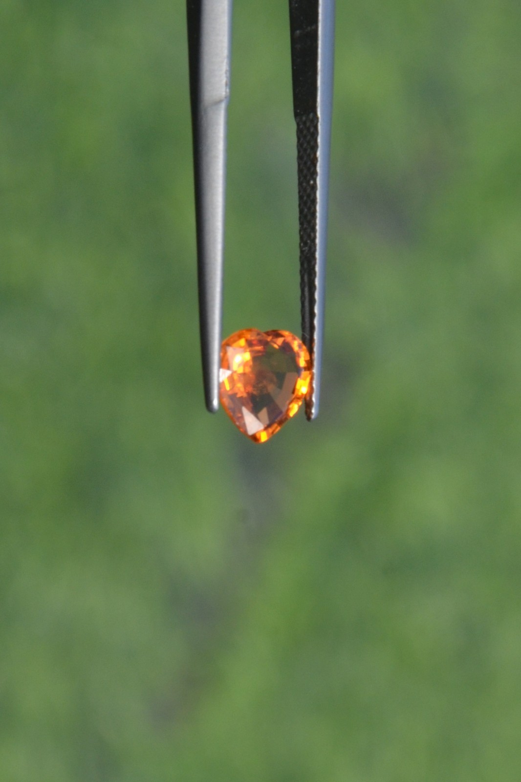Natural Orange Sapphire 1.35 Carat. BE. Heated Heart Step Cut