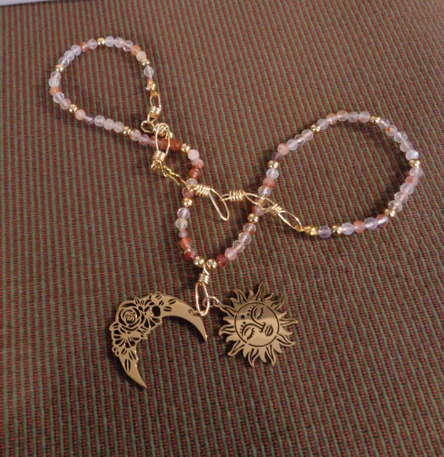 Artisan crafted,18”red rutilated quartz strand, hand knotted on silk, featuring