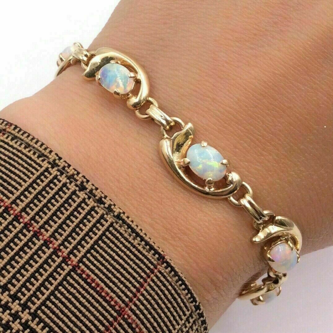 3Ct Oval Cut Lab-Created Opal Ladies Tennis Bracelet 14K Yellow Gold Finish