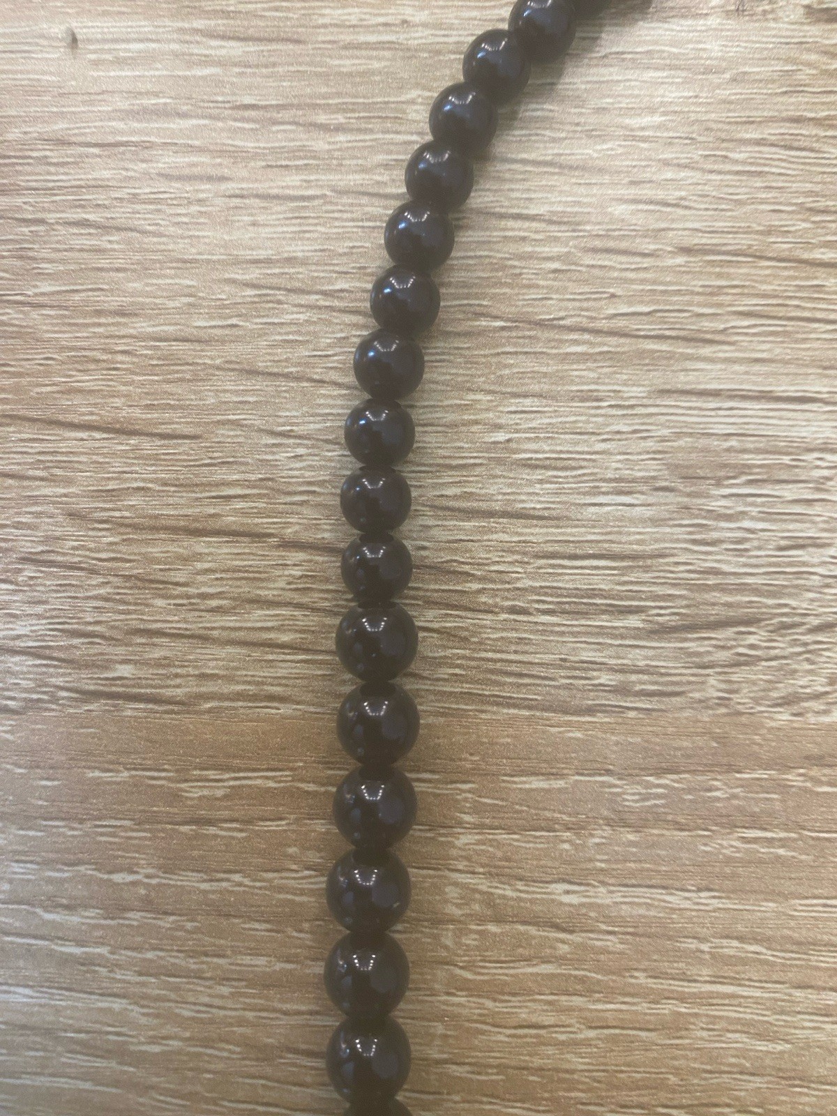 Classic Glossy Black Beaded Necklace Sparkling Rhinestone Accent Gold Tone Clasp