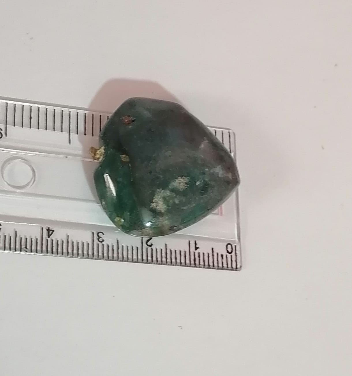 green gemstone pendant