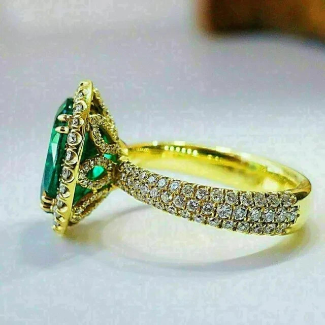 3 Ct Oval Cut Lab-Created Emerald Halo Engagement Ring In 14K Yellow Gold Plated