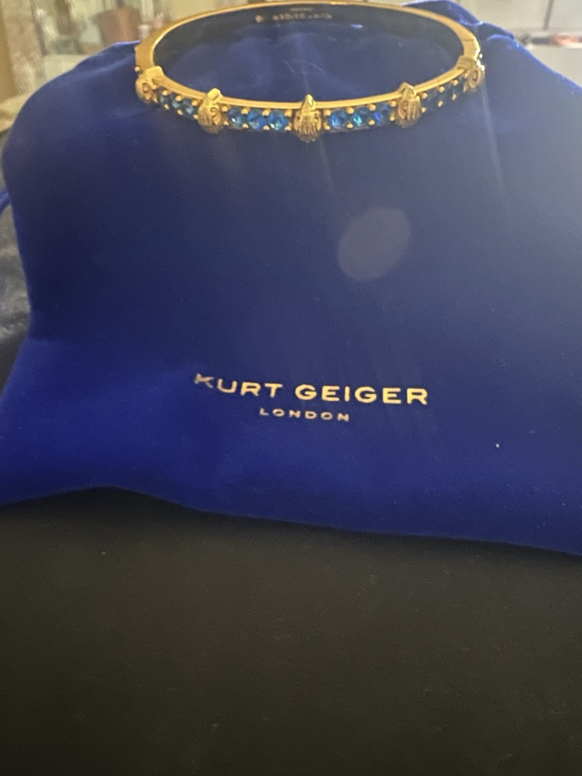KURT GEIGER LONDON Eagle & Blue Rhinestone Detail Gold Bangle Bracelet