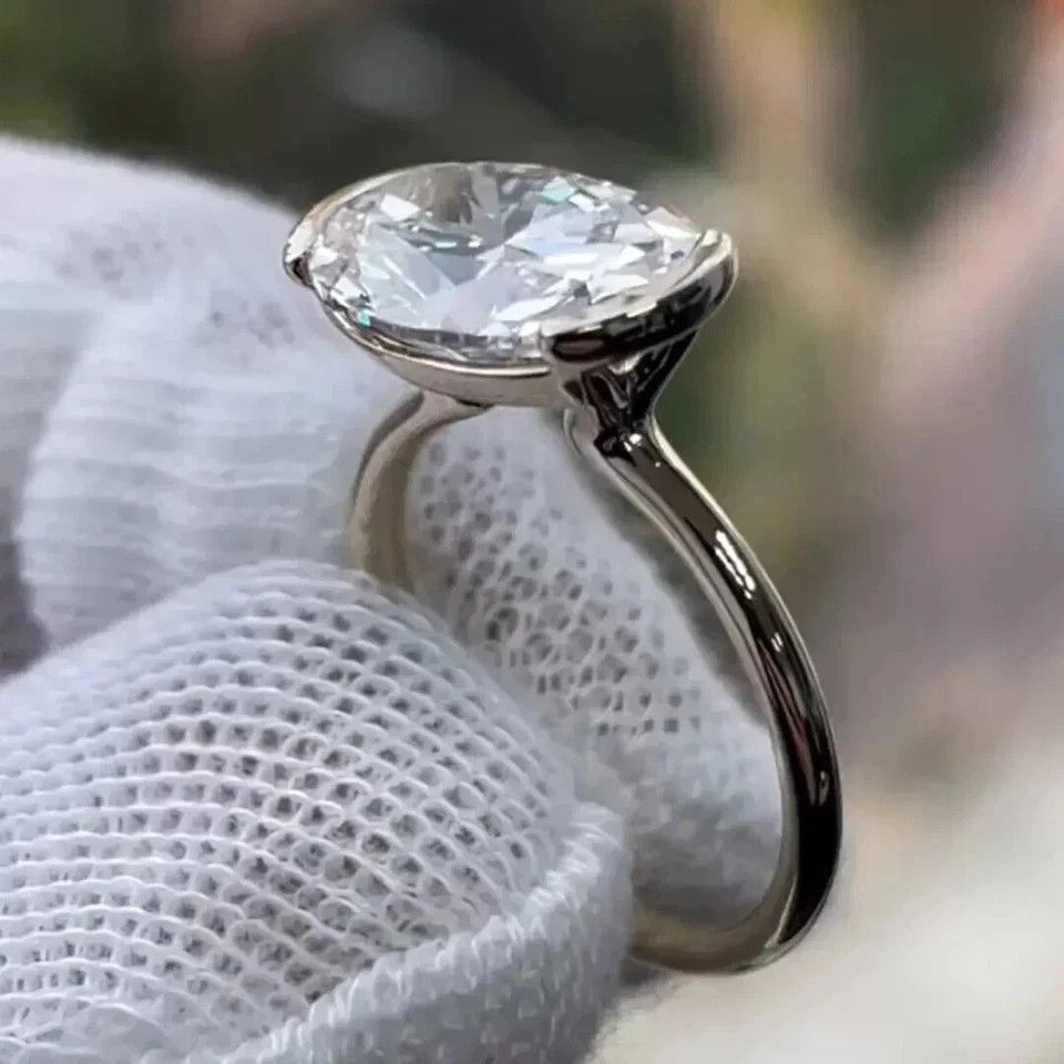 10.55Ct White Oval Treated Diamond Bezel Solitaire Ring 925 Silver Certified
