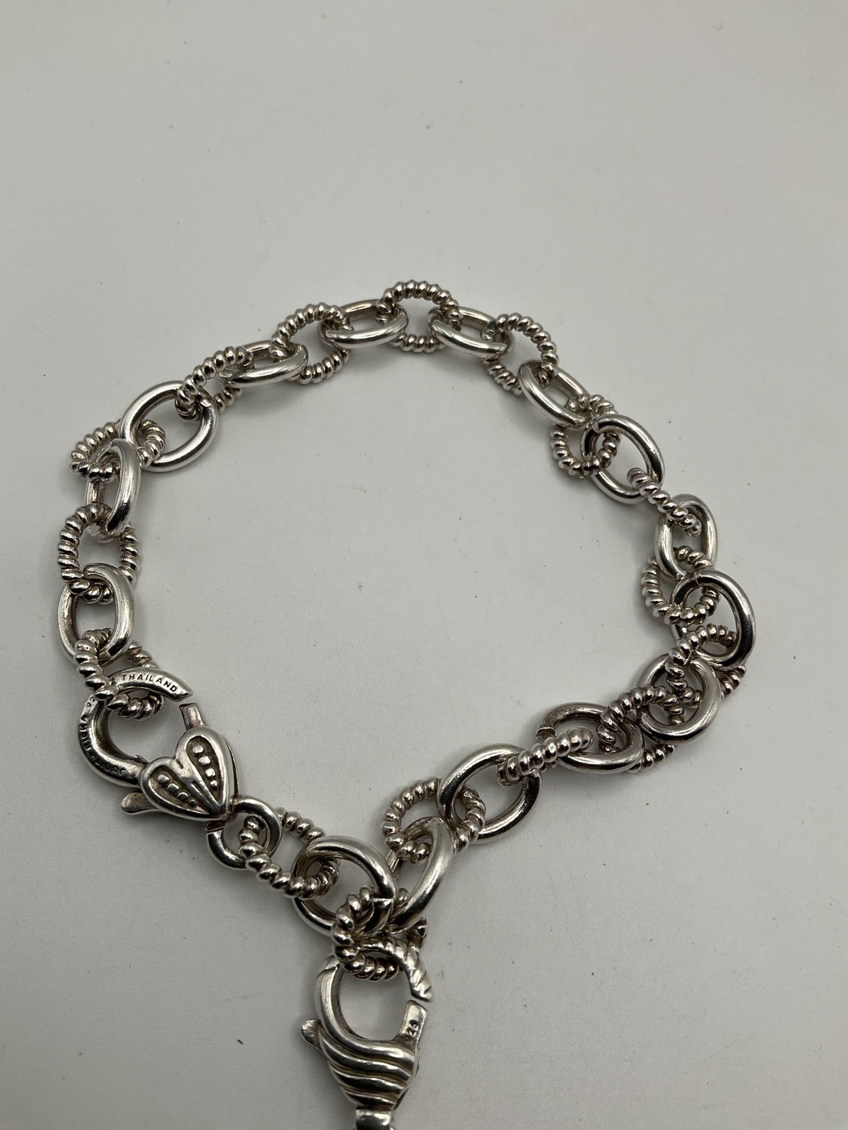 JUDITH RIPKA Sterling Silver link chain with key charm Bracelet 8.5”