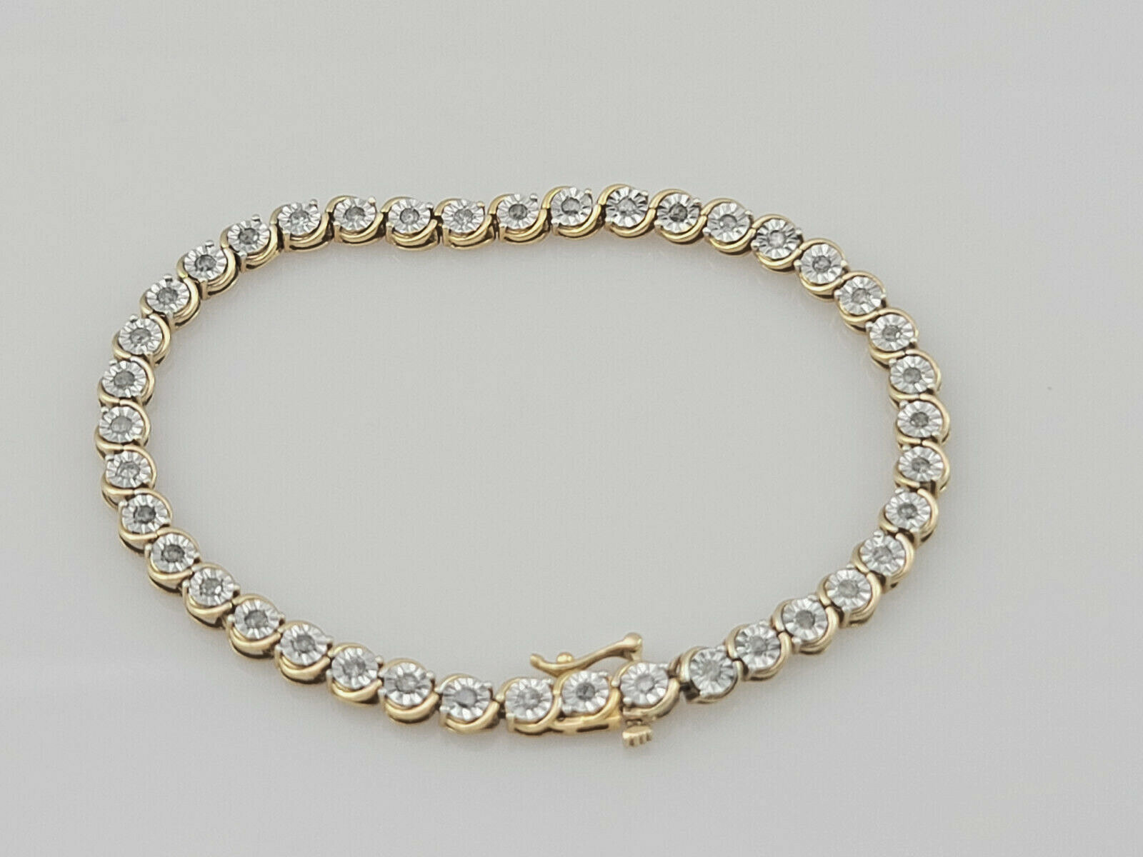 Signed “925 SK9″ 22K Gold Plated, Diamond Tennis Bracelet 7” 5mm, 9.6 grams
