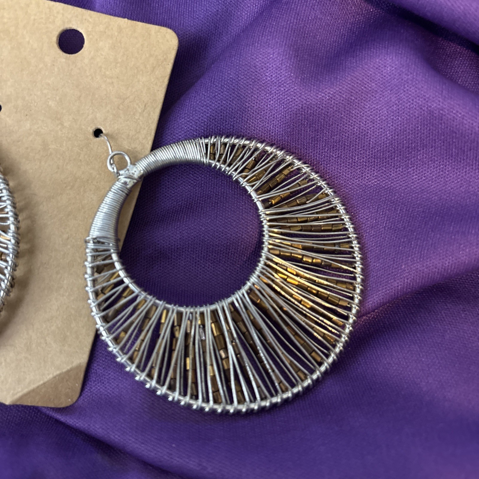 large silver wire wrapped hoop earrings w/ pewter beads.