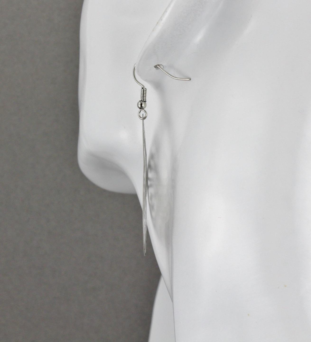 Silver teardrop filigree dangle earrings shiny 2 7/16″ long lightweight scroll