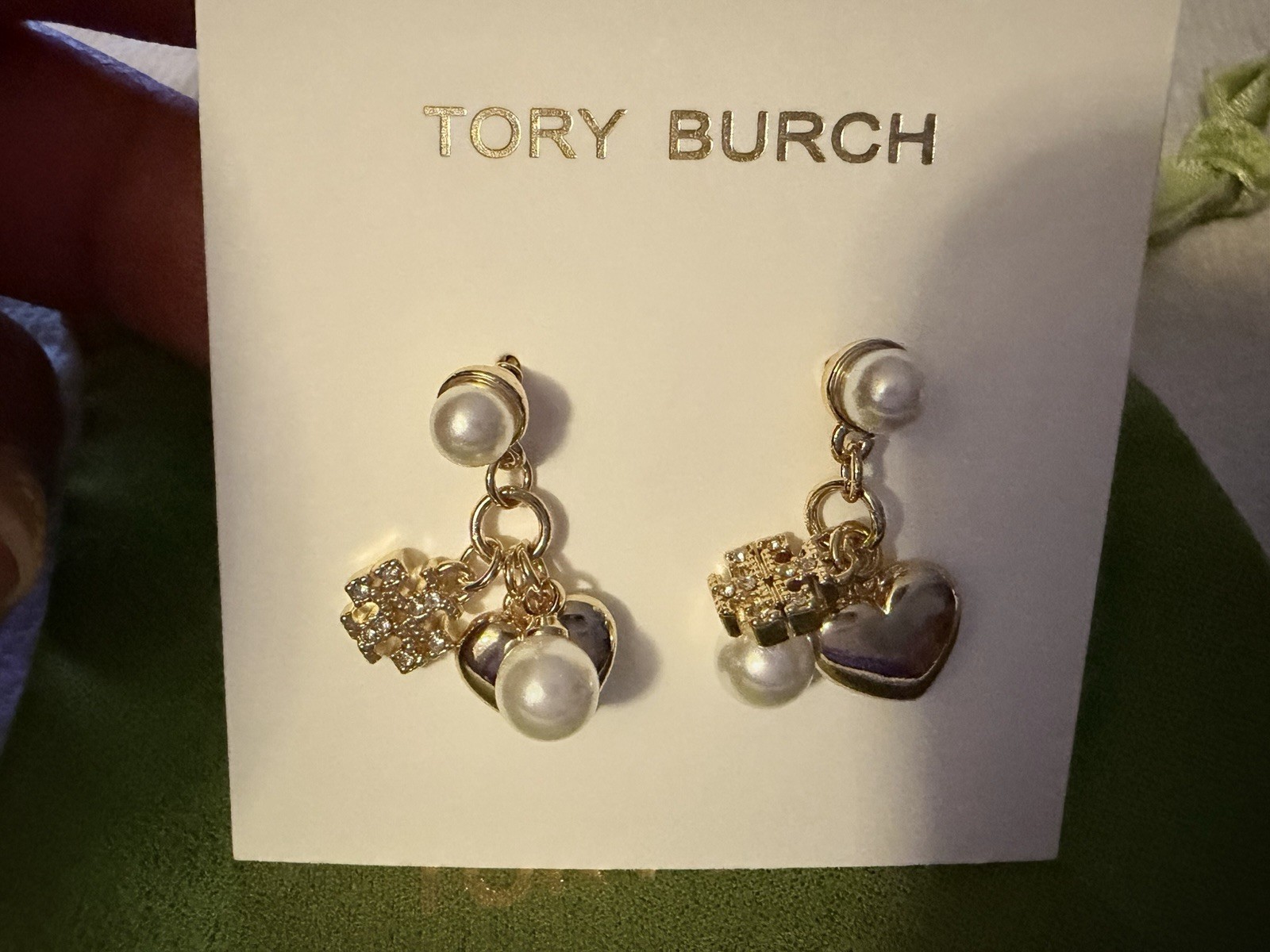 Tory Burch Gold-tone dangling Pearl Heart charms crystal-accented pavé detail
