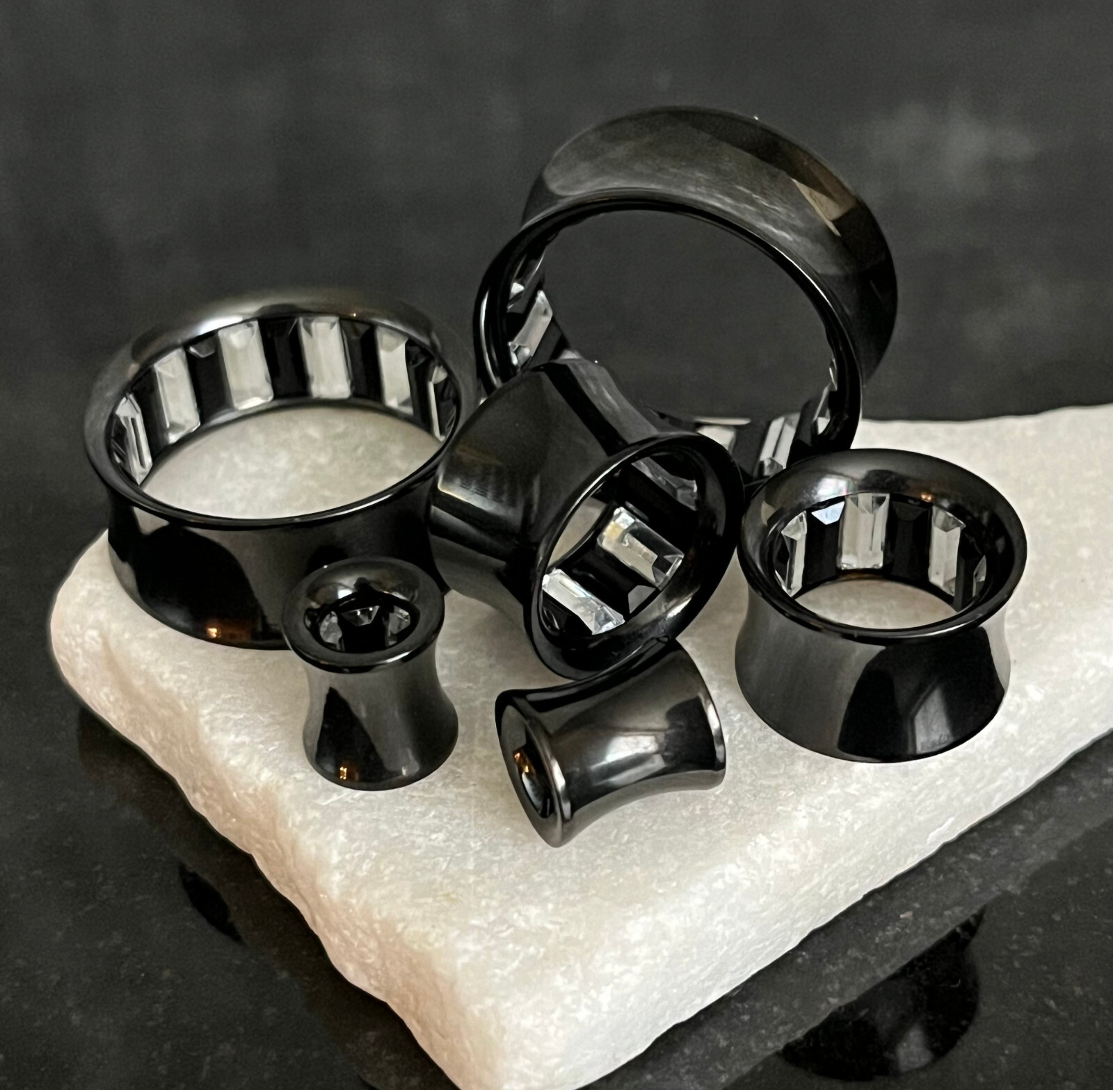 PAIR Inner Clear / Black Gem Black Ion Plated Steel Saddle Tunnels Plugs Gauges