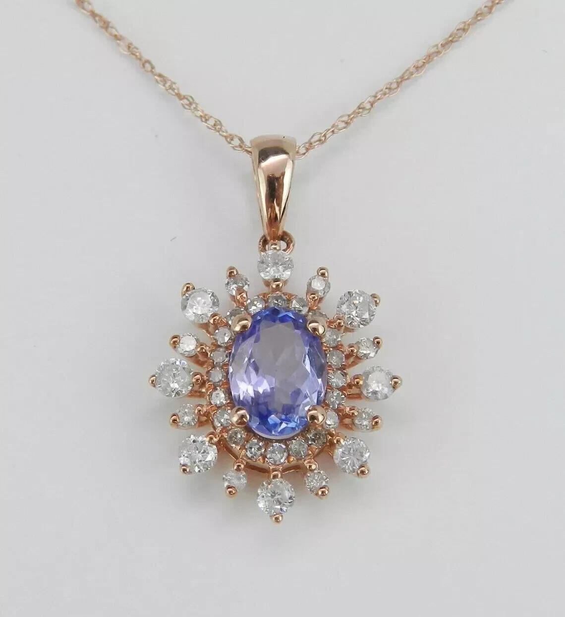2Ct Oval Cut Lab-Created Tanzanite Halo Snowflake Pendant 14K Yellow Gold Plate