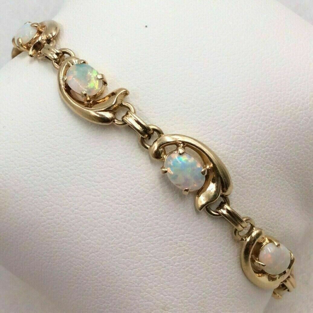 3Ct Oval Cut Lab-Created Opal Ladies Tennis Bracelet 14K Yellow Gold Finish