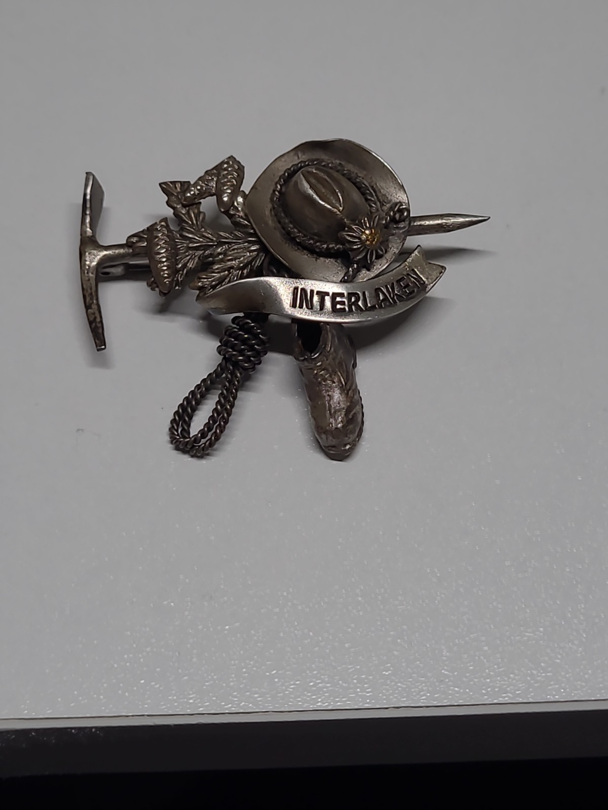 This is a vintage Interlaken, Switzerland souvenir brooch from the 1960s.